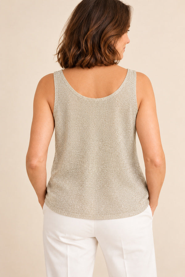 Camille champagne sparkle top with white pants – AI-styled back view