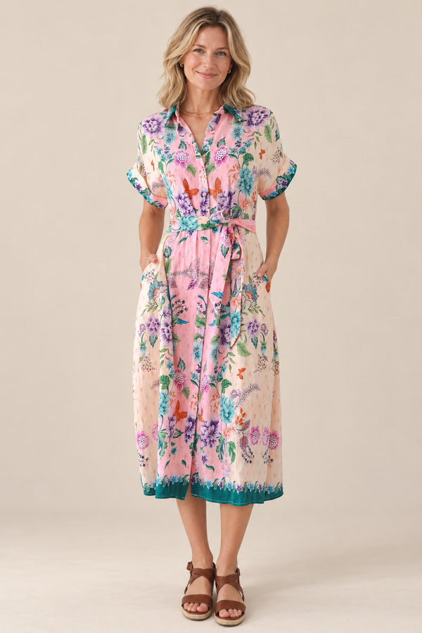Priscilla in Pink dress – AI-styled blonde model view 1
