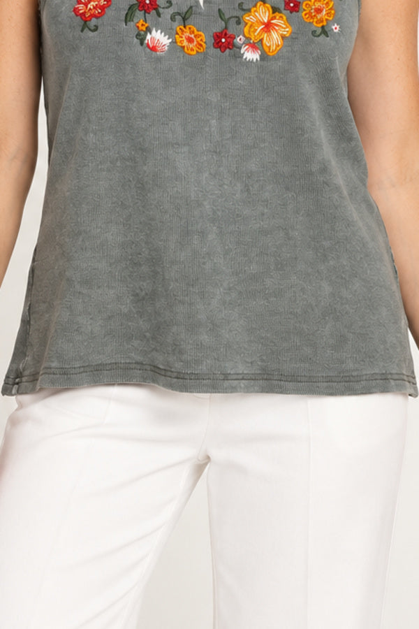 Sweet Ivy Jeanie Singlet green cotton embroidered top — fabric and hem detail