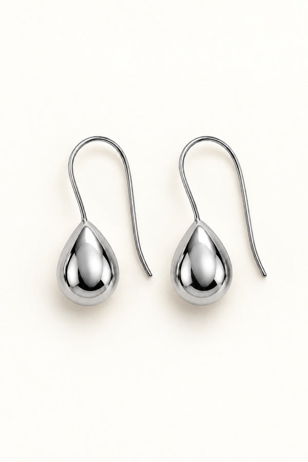 Kristy Earrings silver, pair on ivory background